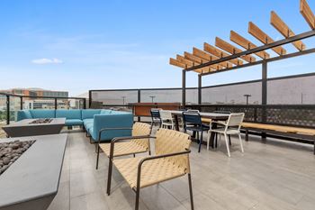 Rooftop sky lounge with mountain & city views, fire pits & seating